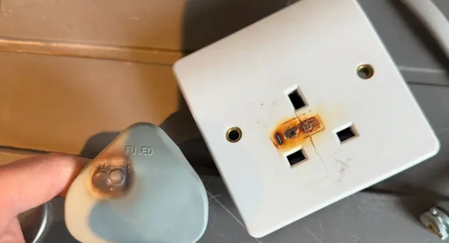 Burnt socket found by Light House Engineering in Dollis Hill